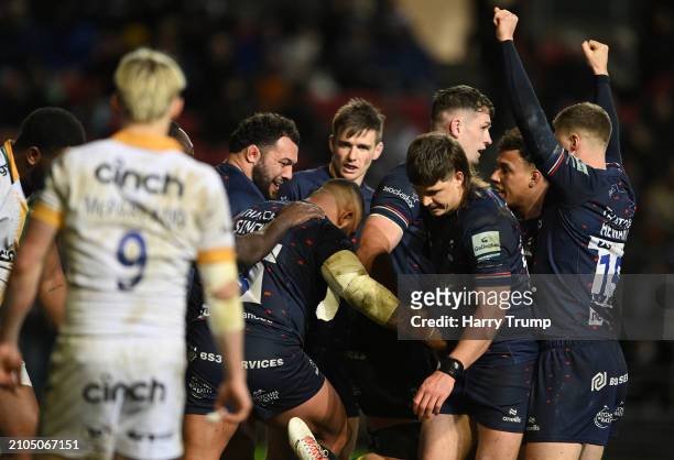Kyle Sinckler of Bristol Bears celebrates scoring his side's third try with teammate Ellis Genge during the Gallagher Premiership Rugby match between...