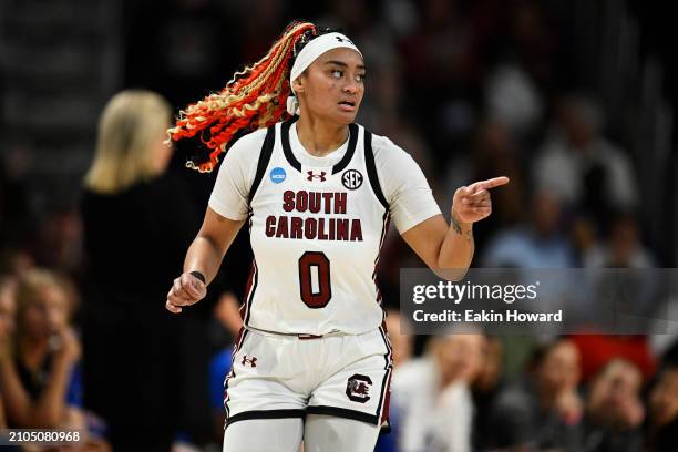 Te-Hina Paopao of the South Carolina Gamecocks celebrates her three-point basket against the Presbyterian Blue Hose in the second quarter during the...
