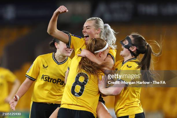 Tammi George of Wolverhampton Wanderers celebrates with teammates after scoring her team's second goal during the FA Women's National League Northern...