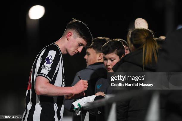 Ciaran Thompson of Newcastle United signs autographs for fans at full time during the Premier League 2 game between Middlesborough U21 and Newcastle...