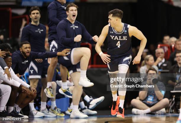 John Poulakidas of the Yale Bulldogs reacts after a three point basket during the second half against the Auburn Tigers in the first round of the...