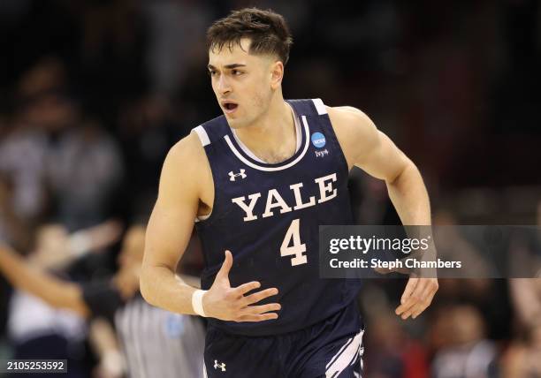 John Poulakidas of the Yale Bulldogs reacts after a three point basket during the second half against the Auburn Tigers in the first round of the...