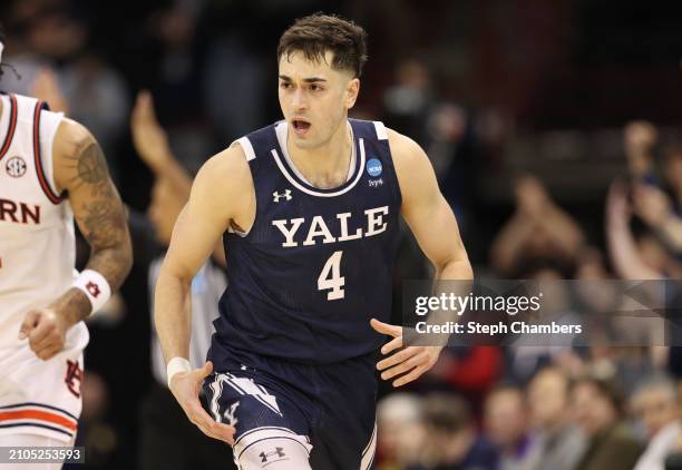 John Poulakidas of the Yale Bulldogs reacts after a three point basket during the second half against the Auburn Tigers in the first round of the...