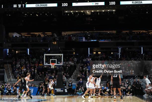 Simpson of the Colorado Buffaloes shots the game winning backet against the Florida Gators during the second half in the first round of the NCAA...