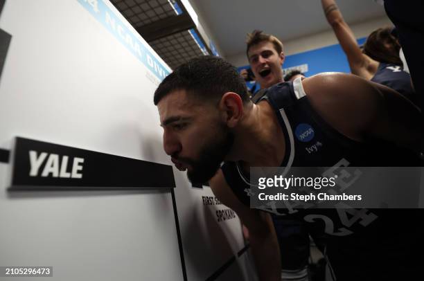 The Yale Bulldogs celebrate in the locker room after a 78-76 victory against the Auburn Tigers in the first round of the NCAA Men's Basketball...