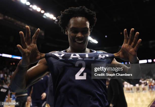 Bez Mbeng of the Yale Bulldogs reacts after a 78-76 victory against the Auburn Tigers in the first round of the NCAA Men's Basketball Tournament at...