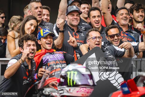 Jorge Martin of Spain and Prima Pramac Racing celebrates with his team the victory of the MotoGP race of Tissot Grand Prix of Portugal on March 24...