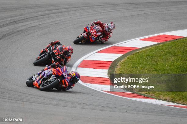 Jorge Martin of Spain and Prima Pramac Racing , Maverick Vinales of Spain and Aprilia Racing and Enea Bastianini of Italy and Ducati Lenovo Team in...