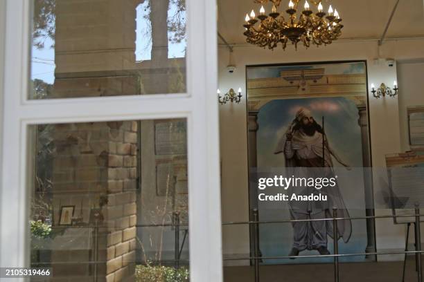 View of a painting as people visit the Fire Temple of Yazd also known as Yazd Atash Behram, which is a Zoroastrian temple, in Yazd, Iran on March 7,...