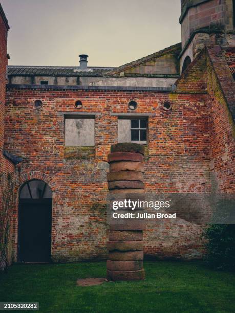 The Brown Miller's Stack sculpture by Sean Scully in Houghton Hall is photographed for the Financial Times on April 6, 2023 in New Houghton, England.
