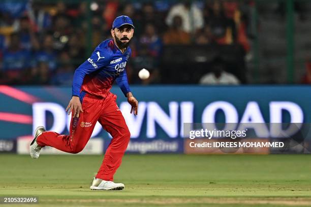 Royal Challengers Bengaluru's Virat Kohli runs to field the ball during the Indian Premier League Twenty20 cricket match between Royal Challengers...