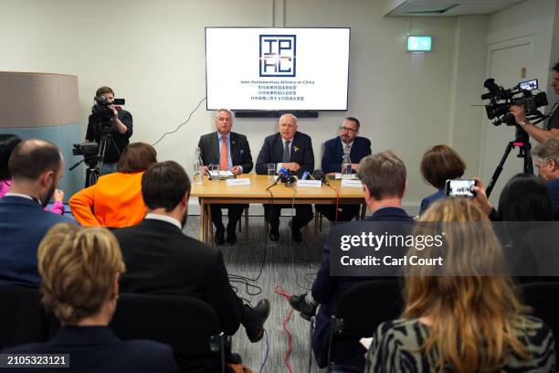 British Parliamentarians Tim Loughton, Iain Duncan Smith and Stewart McDonald, hold a press conference following allegations that China is...