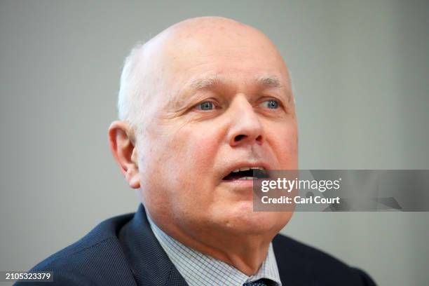 British Parliamentarians Iain Duncan Smith speaks at a press conference following allegations that China is responsible for cyberattacks on the UK...