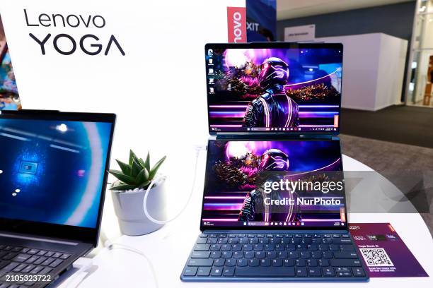 Lenovo is exhibiting the Yoga Book 9i, a laptop with dual OLED touchscreens, at the Mobile World Congress 2024 in Barcelona, Spain, on March 25, 2024.