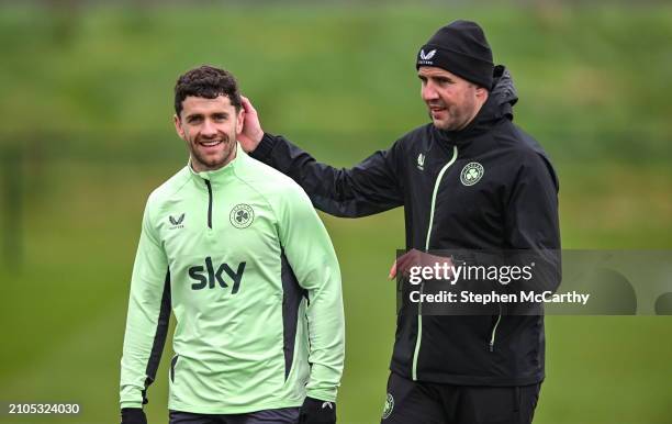 Dublin , Ireland - 25 March 2024; Interim head coach John O'Shea and Robbie Brady, left, during a Republic of Ireland training session at FAI...