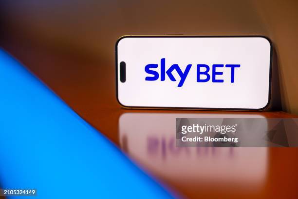 The logo of Sky Bet, a Flutter Entertainment Plc brand, on a smartphone arranged in London, UK, on Monday, March 25, 2024. Flutter are to due to...