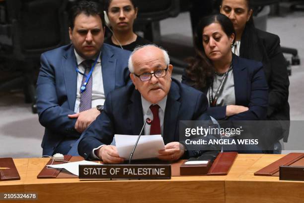 Palestinian Ambassador to the United Nations Riyad Mansour speaks during a UN Security Council meeting on the situation in the Middle East, including...
