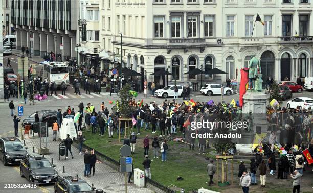 Supporters of the PKK , confront the police during a protest near the European Parliament on March 25, 2024 in Brussels, Belgium.