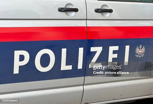 March 2024, Austria, Wien: The word "police" on an emergency vehicle in Austria. In Austria, a 91-year-old driver ran over and fatally injured his...