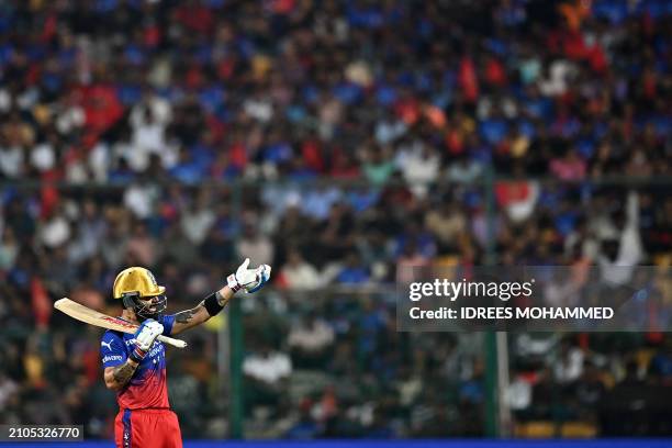 Royal Challengers Bengaluru's Virat Kohli gestures during the Indian Premier League Twenty20 cricket match between Royal Challengers Bengaluru and...