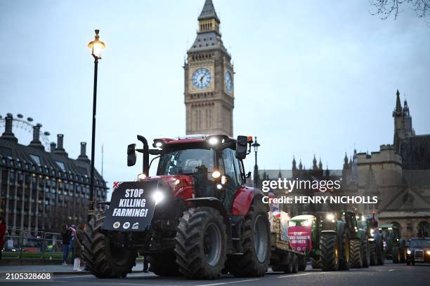 Farmers drive tractors around Parliament Square during a demonstration organised by Save British Farming against UK food policy, substandard imports...