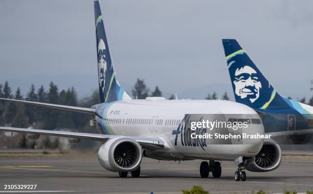 An Alaska Airlines Boeing 737 MAX 9 taxis at Seattle-Tacoma International Airport on March 25, 2024 in Seattle, Washington. A mid-air door plug...