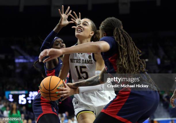 Natalija Marshall of the Notre Dame Fighting Irish has a shot blocked by Madison Scott of the Ole Miss Rebels during the second round of the 2024...