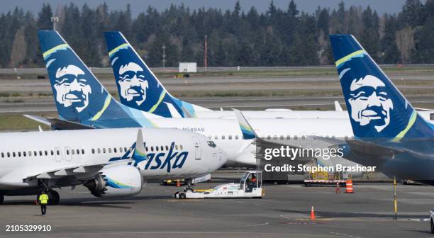 An Alaska Airlines Boeing 737 MAX 9 airliner backs away from the terminal at Seattle-Tacoma International Airport on March 25, 2024 in Seattle,...