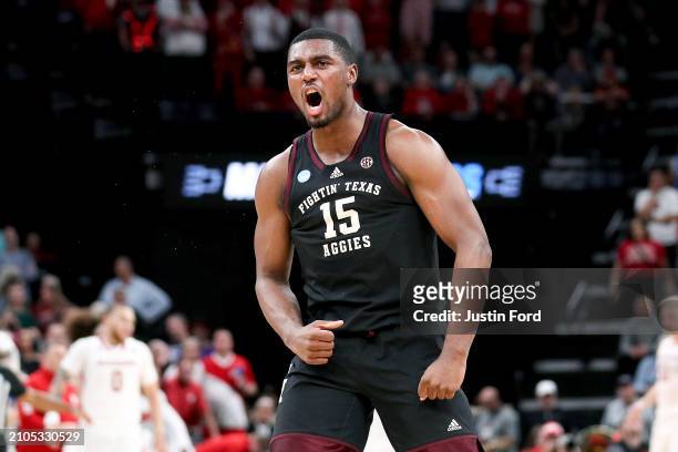 Henry Coleman III of the Texas A&M Aggies celebrates a basket against the Nebraska Cornhuskers during the first half in the first round of the NCAA...