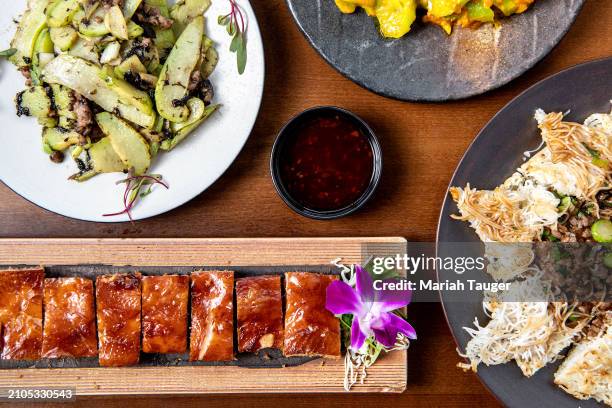 Clockwise from top left: Sautéed chayote with minced pork, Golden Yolk Luffa, Well-done Beef Vermicelli and Crispy stuffed Chicken from Colette...