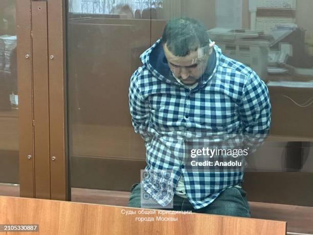 One of the three more suspects of the deadly terror attack on the Crocus City Hall, is seen before appearing at the Basmanny District Court in...