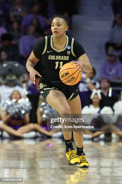 Quay Miller brings the ball up court in the third quarter of the Colorado Buffaloes versus Kansas State Wildcats game in the second round of the NCAA...