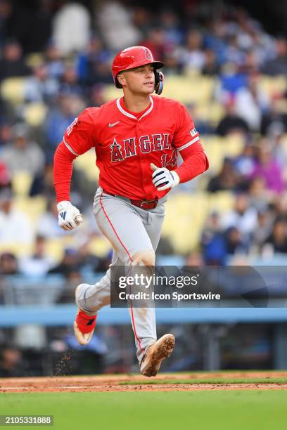 Los Angeles Angels catcher Logan O'Hoppe runs up the first baseline during the MLB Spring Training game between the Los Angeles Angels and the Los...