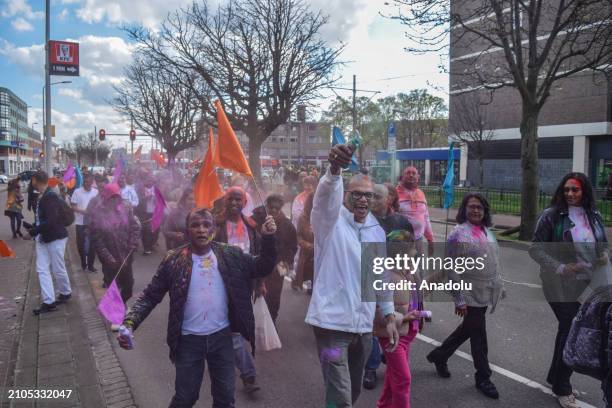 View of the celebration of Holi-Phagwa as they throw colored powder and spray water in the Transvaal district of The Hague, Netherlands on March 25,...