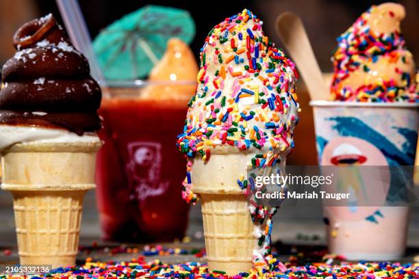 From left: Black sesame vanilla with a dark chocolate dip, cherry hibiscus mango "Sippy Whip", sesame vanilla w/ rainbow sprinkles and hibiscus mango...