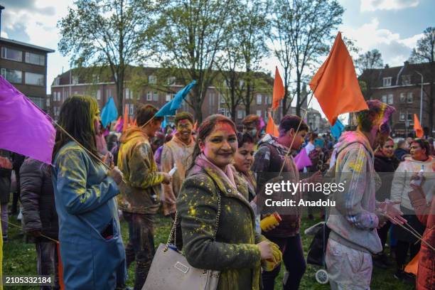 View of the celebration of Holi-Phagwa as they throw colored powder and spray water in the Transvaal district of The Hague, Netherlands on March 25,...