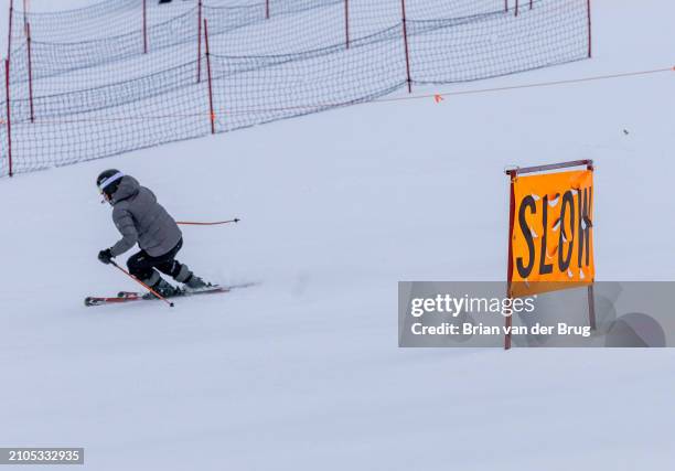 Mammoth Lakes, CA Signs warn skiers and riders to slow down near train junctions at Mammoth Mountain on Thursday, March 14, 2024 in Mammoth Lakes, CA.