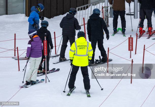 Mammoth Lakes, CA Yellow-jacketed mountain safety provides safety related customer service at Mammoth Mountain on Thursday, March 14, 2024 in Mammoth...