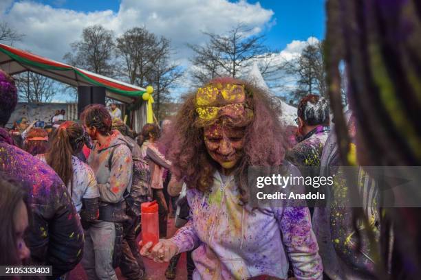 View of the celebration of Holi-Phagwa as they throw colored powder and spray water in the Transvaal district of The Hague, Netherlands on March 25,...