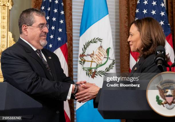 Bernardo Arevalo, Guatemala's president, left, and US Vice President Kamala Harris shake hands during a meeting in the Vice President's Ceremonial...