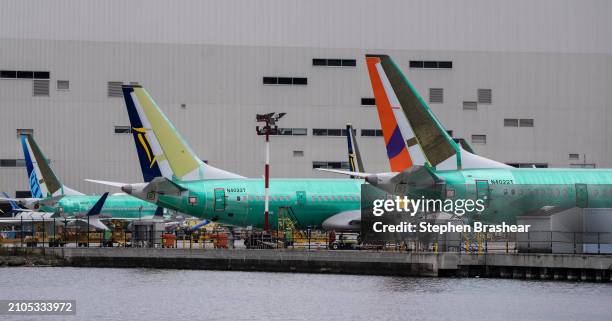 Boeing 737 MAX airplanes are pictured outside a Boeing factory on March 25, 2024 in Renton, Washington. A mid-air door plug blowout on an Alaska...