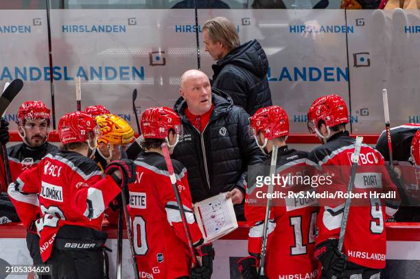 Assistant Coach Peter Andersson of Lausanne HC talk to players during time out during the Swiss National League Play Offs game between Lausanne HC...
