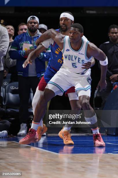 Anthony Edwards of the Minnesota Timberwolves looks on during the game against the Denver Nuggets on March 19, 2024 at Target Center in Minneapolis,...