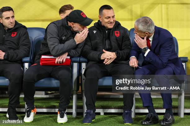 Sylvinho the head coach / manager of Albania sat in the dugout alongside Doriva and Pablo Zabaleta assistant head coach / manager of Albania during...