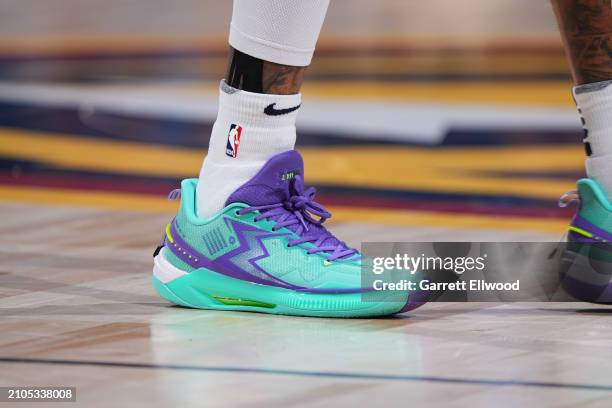 The sneakers worn by Kentavious Caldwell-Pope of the Denver Nuggets during the game against the Memphis Grizzlies on March 25, 2024 at the Ball Arena...