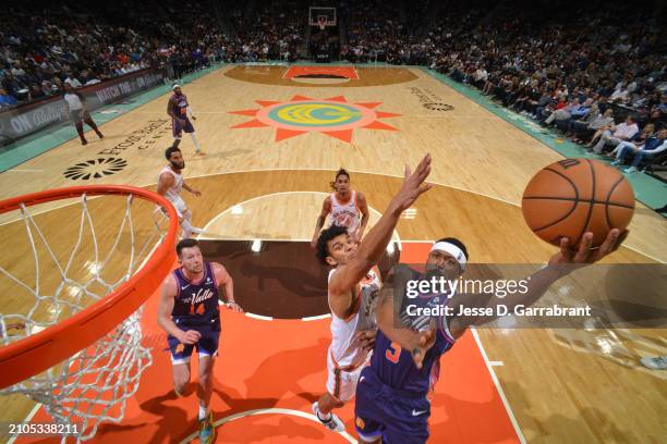 Bradley Beal of the Phoenix Suns drives to the basket during the game against the San Antonio Spurs on March 25, 2024 at the AT&T Center in San...