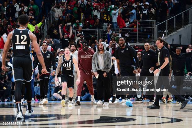 Look at the Atlanta Hawks bench celebrating during the game on March 25, 2024 at State Farm Arena in Atlanta, Georgia. NOTE TO USER: User expressly...
