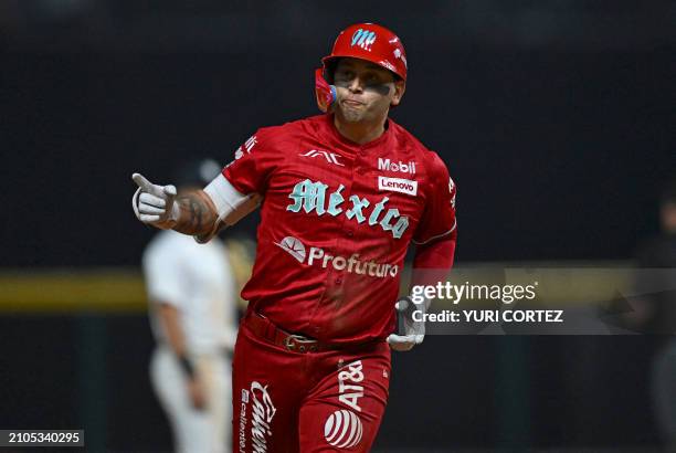 Mexico Los Diablos Rojos' Juan Carlos Gamboa celebrats a homerun during the international friendly baseball game between the New York Yankees and...