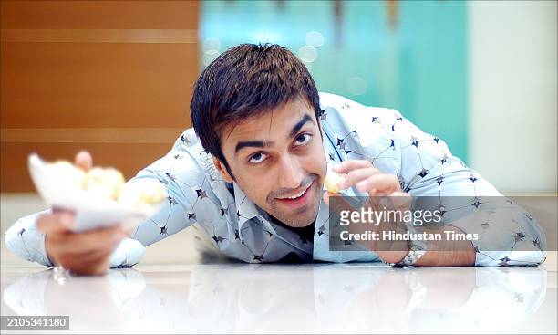 Bollywood actor Aashish Chaudhary poses during promotion of upcoming movie Shaadi Ke Laddoo on April 10, 2004 in New Delhi, India.
