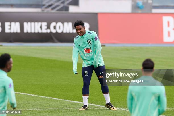 Endrick Felipe Moreira de Sousa, known as Endrick of Brazil smiles during the Brazilian National Football Team training on the eve of the...